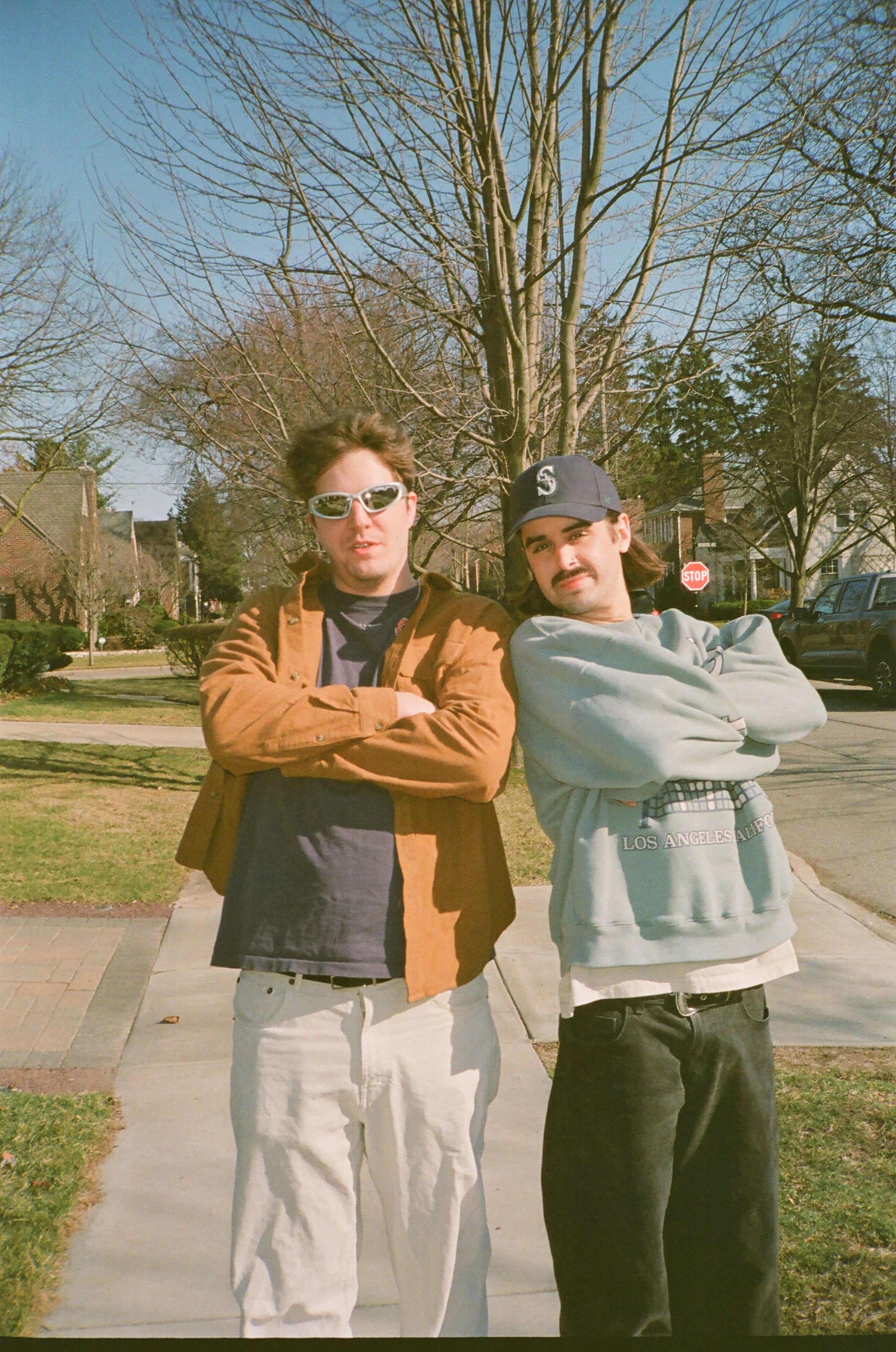Two friends standing outdoors